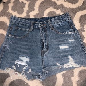 ripped denim blue Jean shorts